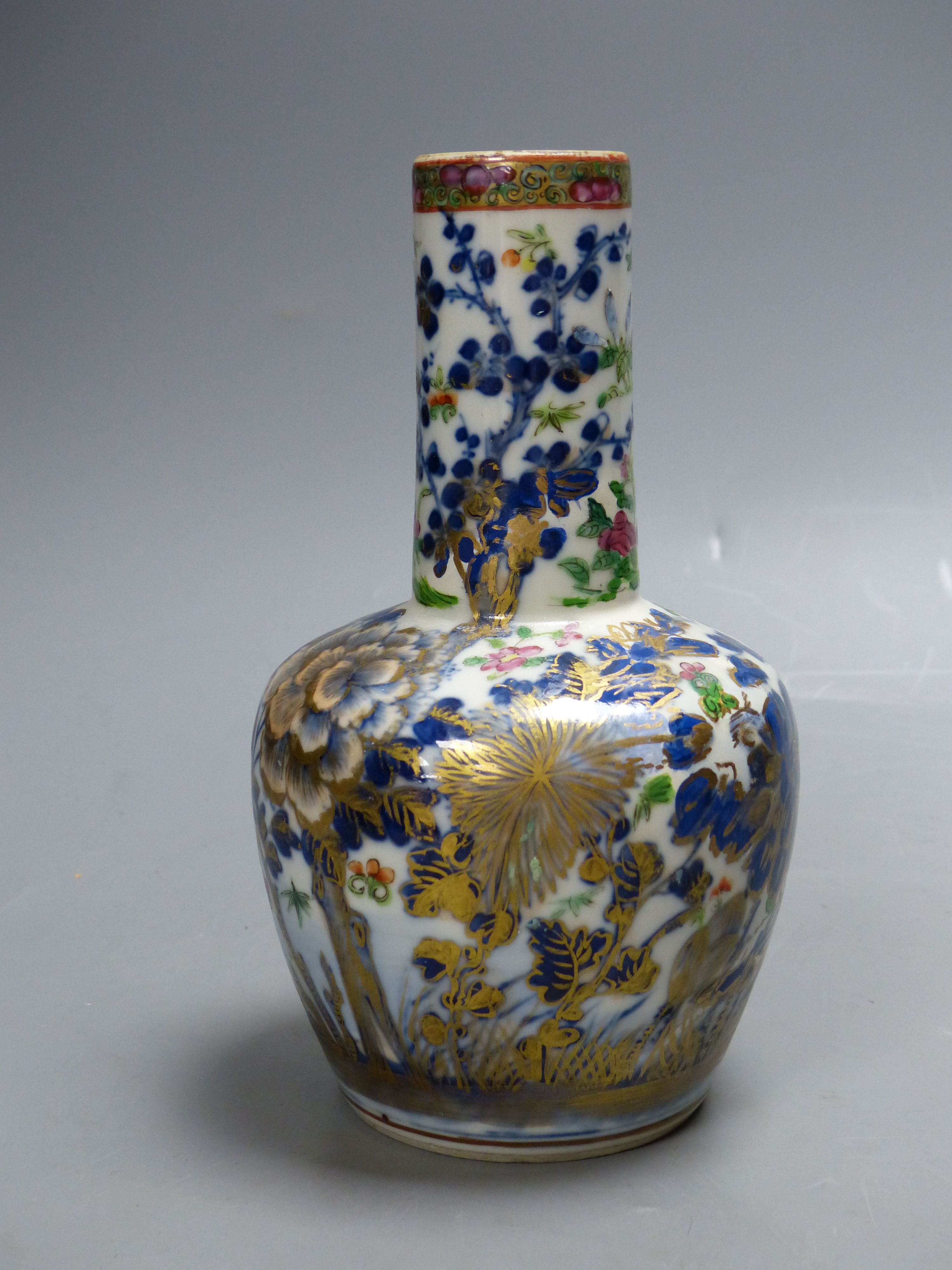A Chinese famille rose bottle vase, Daoguang period, height 19cm (restored)